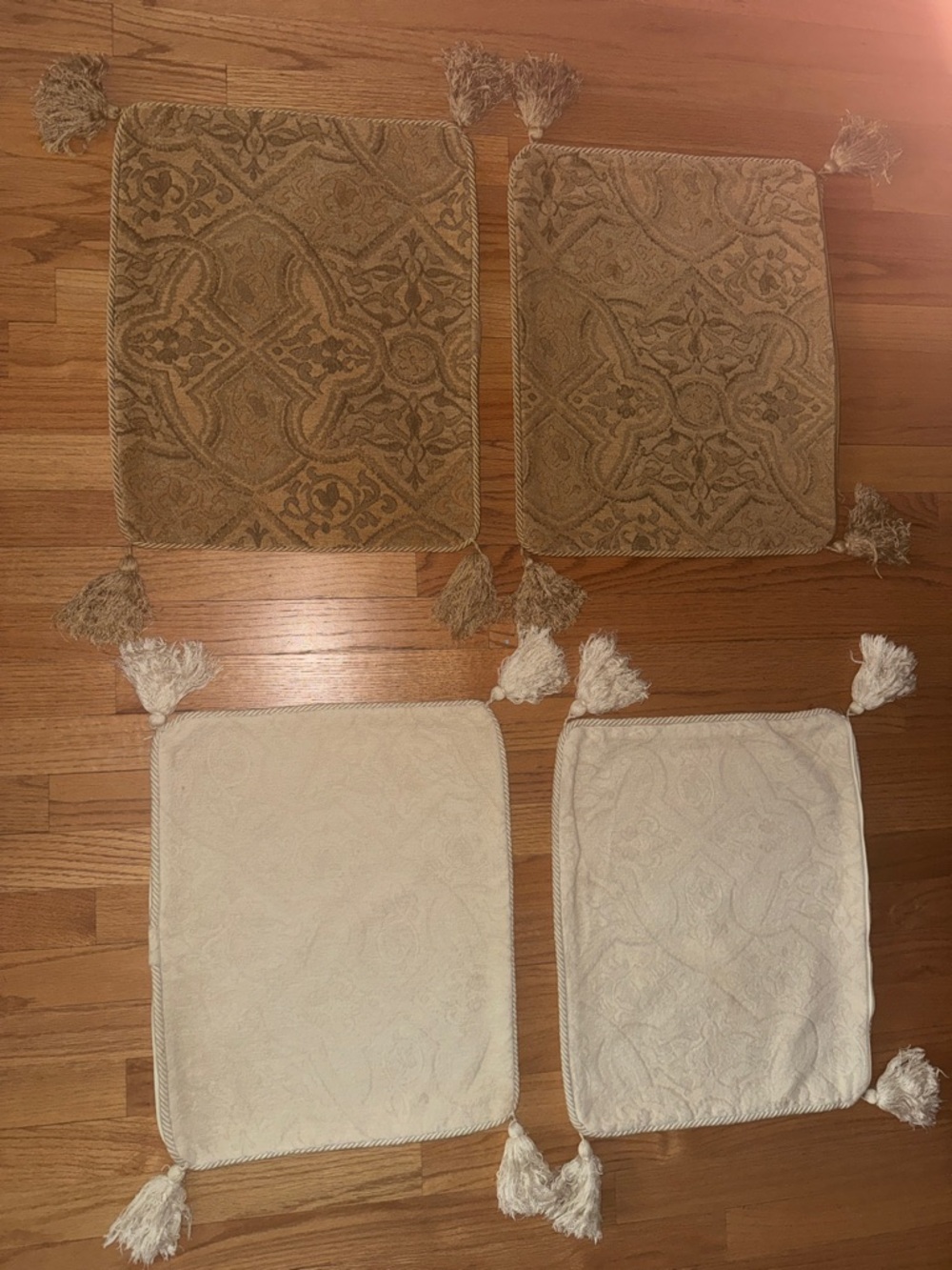 Laura Ashley Set of Four Decorative Tassel decorative pillow cases.